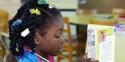  photo african-american-girl-reading.jpg