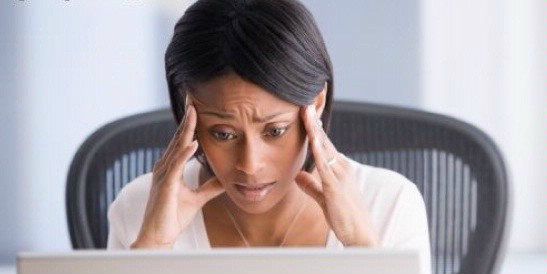 photo black-woman-at-work-stressed_zps895cc077.jpg
