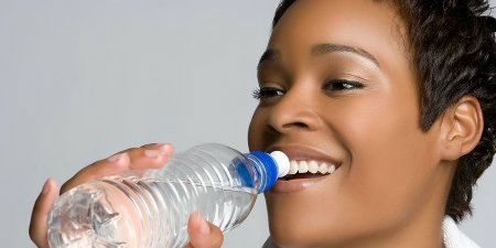  photo black-woman-drinking-water.jpg